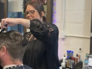 Malinda Daley, a barber at Barrelli Barber Charleston