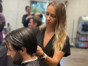 Kristina Brown, a barber at Barrelli Barber Charleston